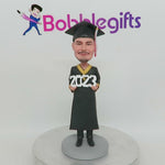 Poupée de bobblehead de graduation masculine de coutume 2024