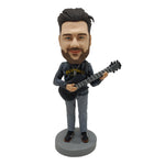 Bobblehead Doll pour les mélomanes avec de la guitare