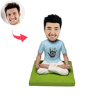 Méditation de l'homme Bobblehead Doll