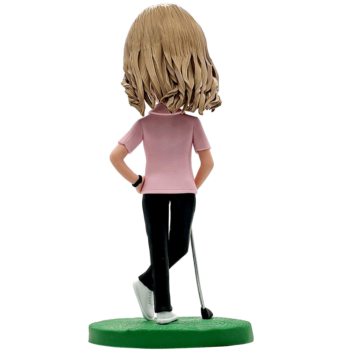 Bobblehead de golf féminine heureuse en chemise rose