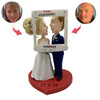 Bobblehead de gâteau de mariage avec cadre photo